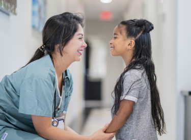 Doctor Talking to a Little Girl