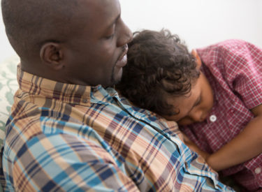 Father Comforting Upset Son